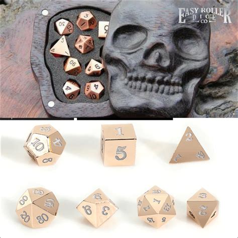 Win a Set of Metal Rose Gold Dice and Wooden Skull Box Worth